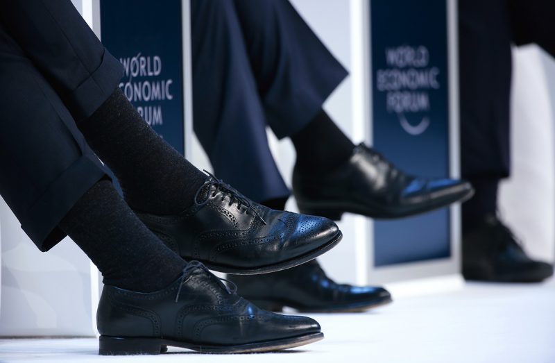 A speaker wears leather brogue shoes during a panel session at the World Economic Forum (WEF) in Davos, Switzerland, on Thursday, Jan. 21, 2016. World leaders, influential executives, bankers and policy makers attend the 46th annual meeting of the World Economic Forum in Davos from Jan. 20 - 23. Photographer: Jason Alden/Bloomberg